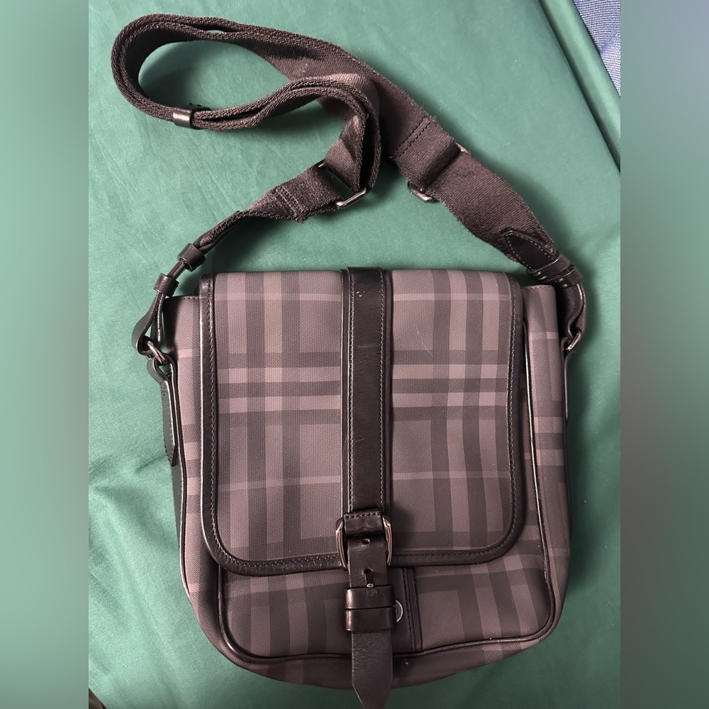 Burberry 
2000-2017 Smoke Check Coated Canvas crossbody bag